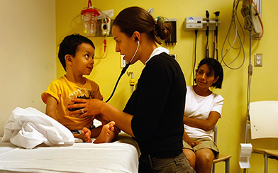 Pediatric doctor treating a Medicaid patient