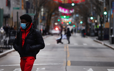  A man walks down a street in Brooklyn on December 01, 2020 in New York City. New York City, and much of the nation, is bracing for a surge of COVID-19 cases