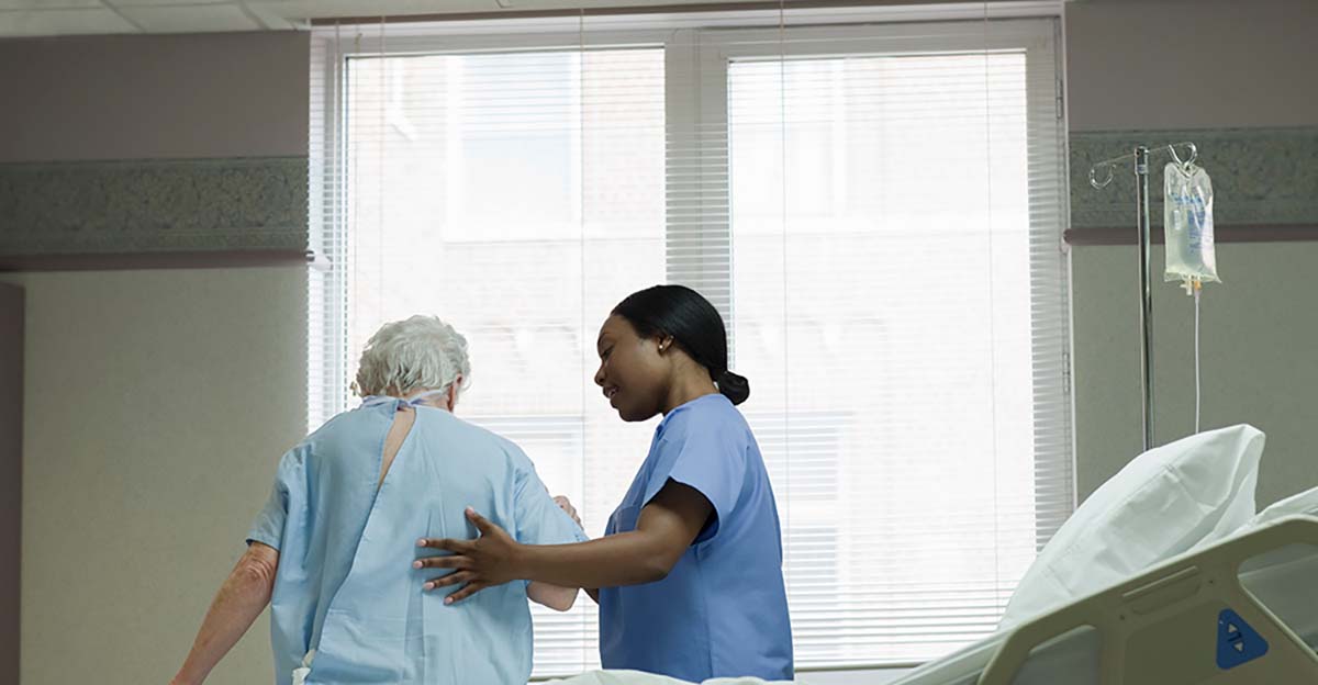 Nurse helps elderly patient