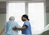 Nurse helps elderly patient 