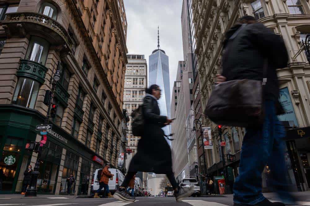 People walk through lower Manhattan