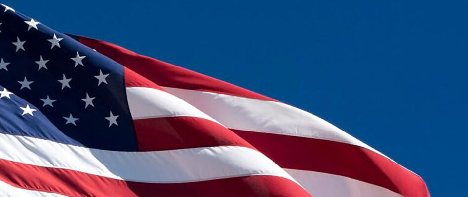 Flag waving on blue background