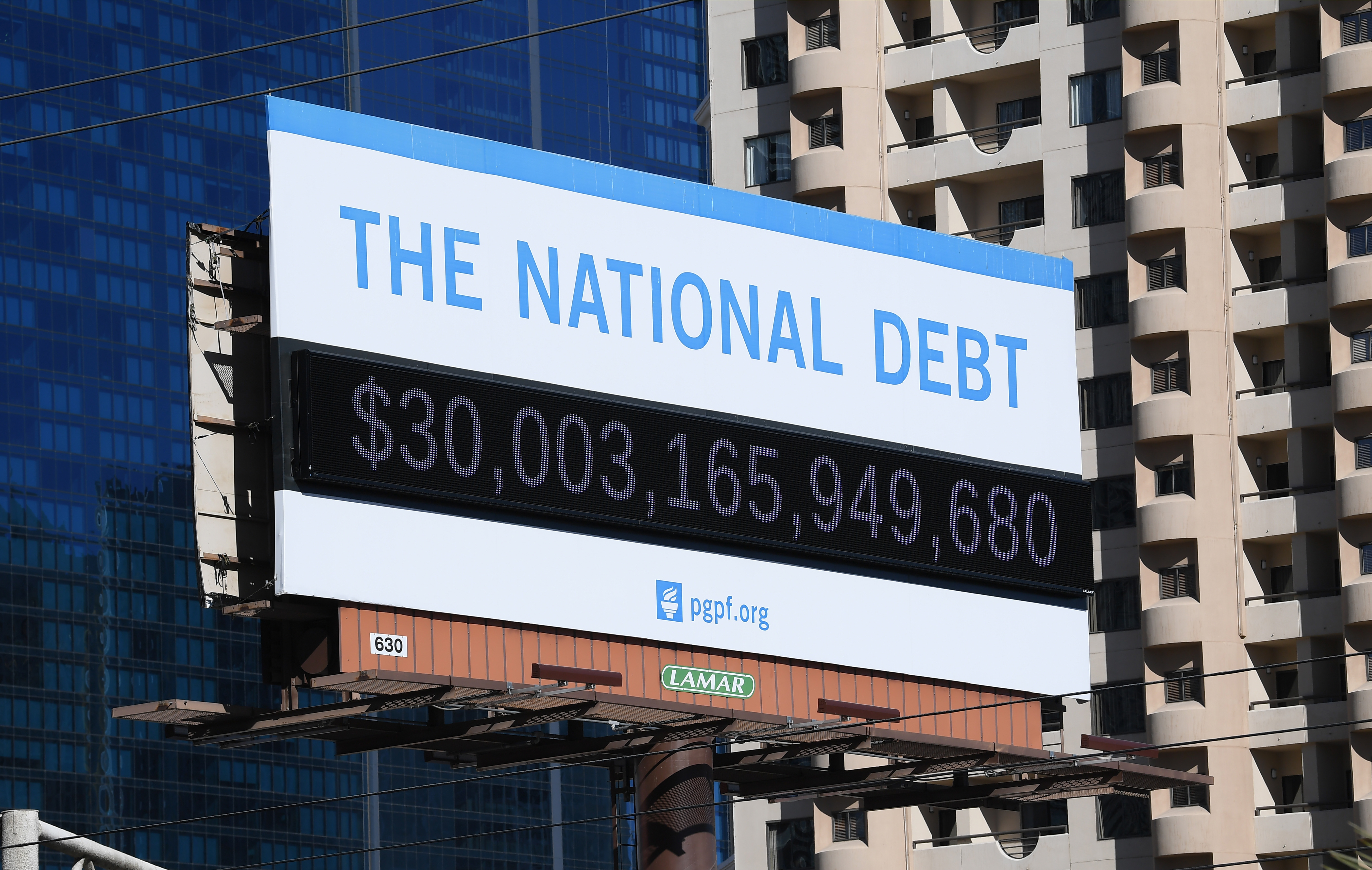 A Peterson Foundation billboard displaying the national debt and each American's share is pictured on February 08, 2022 in Las Vegas, Nevada.