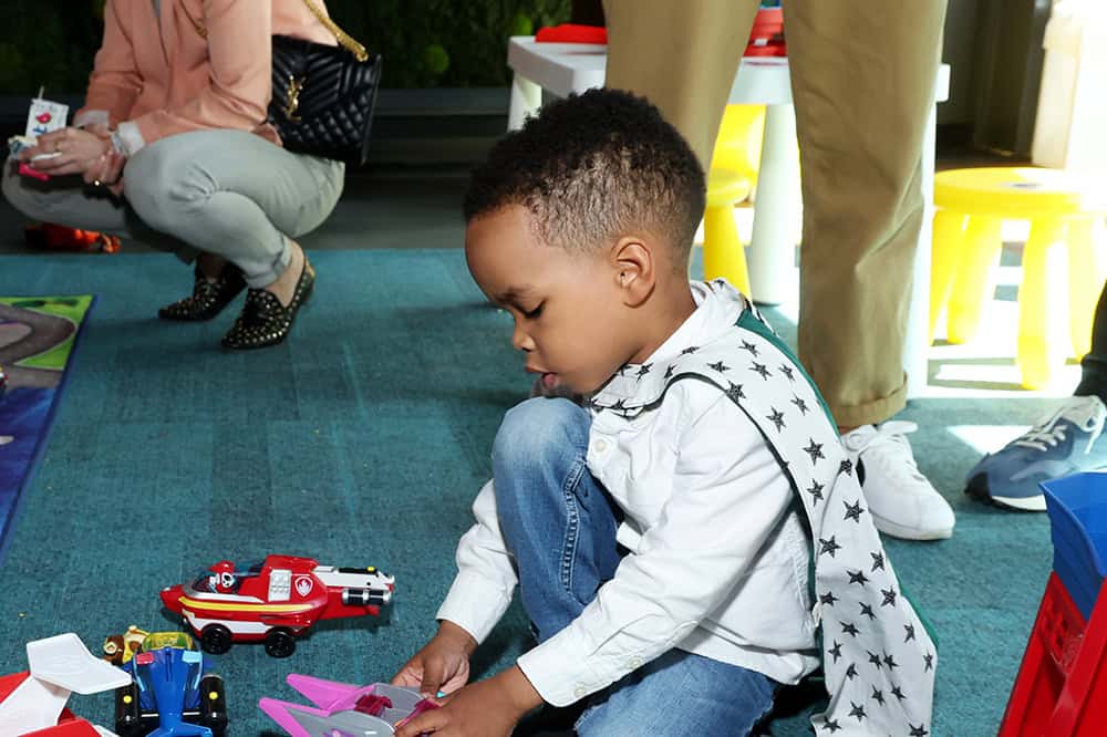 Child playing with toy