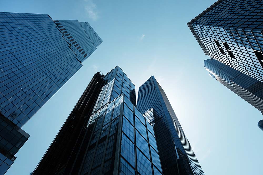 View of skyscraper buildings from the ground.